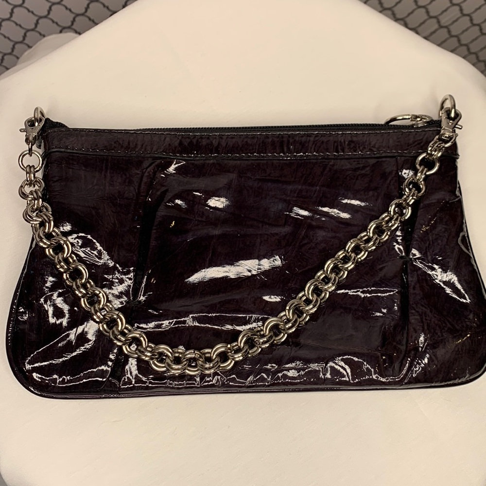 Francesco Biasia bag with chain handle.  Gun metal grey with black accents.